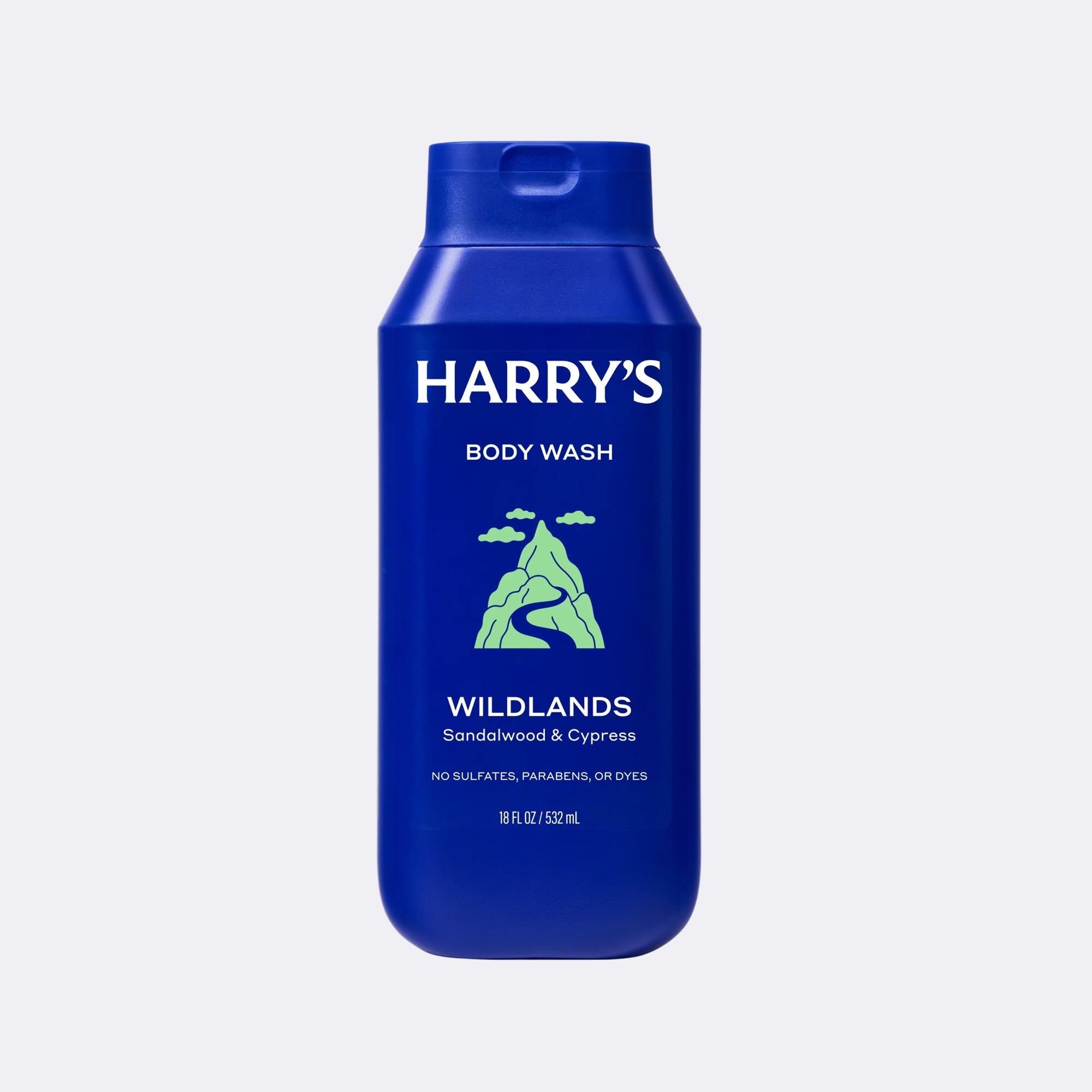A blue bottle of Harry's Body Wash, Wildlands scent, on a light gray background.