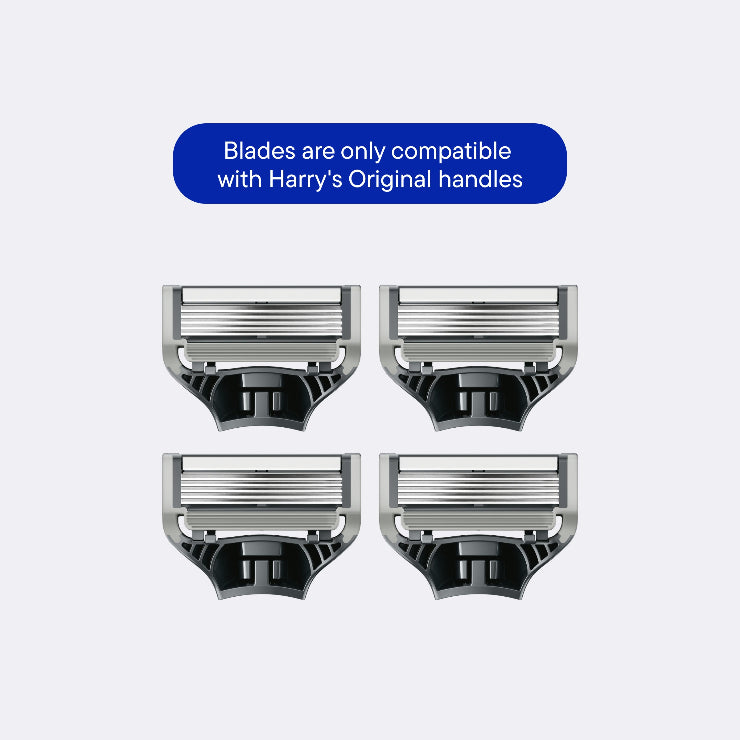 Four razor blades with a blue label indicating compatibility with 'Harry's Original handles' on a light gray background.
