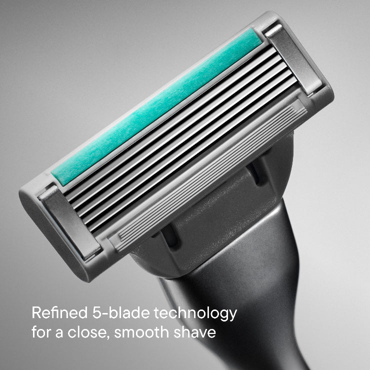 Close-up of the Harry's Plus blade cartridge on a gray background